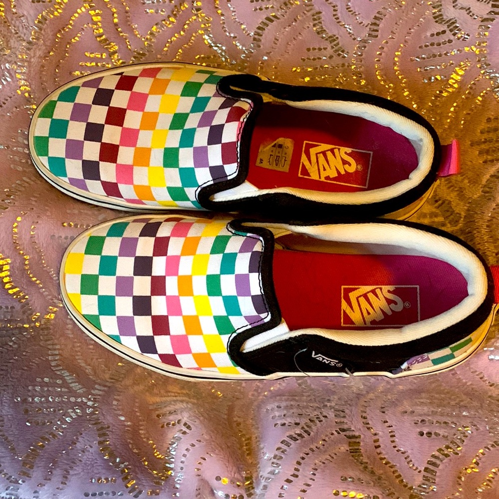 Multicolored gently worn vans size 2. Excellent condition